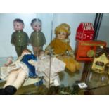 SEVEN VARIOUS SMALL VINTAGE DOLLS AND THREE OLD COLLECTION BOXES.