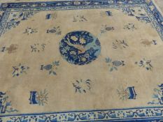 AN ANTIQUE CHINESE CARPET. 350 x 280cms.