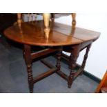 AN 18th.C.OAK COUNTRY COTTAGE GATELEG TABLE WITH END DRAWER. W.101cms.