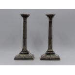 A PAIR OF SILVER NEO CLASSICAL COLUMN CANDLESTICKS 1759, LONDON. APPROXIMATE HEIGHT 20cms.
