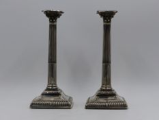 A PAIR OF SILVER NEO CLASSICAL COLUMN CANDLESTICKS 1759, LONDON. APPROXIMATE HEIGHT 20cms.