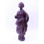 AN EARLY ANTIQUE CARVED OAK FIGURE OF A STANDING FEMALE SAINT. H.29cms.