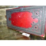 AN ANTIQUE LEUCHARS OF PICADILLY LEATHER FOLDING GAMES BOARD WITH GILT TOOLED DECORATION AND