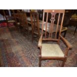 A SET OF six EARLY 20th.C.ARTS AND CRAFTS OAK DINING CHAIRS.