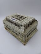 A 19th. EAST EUROPEAN CARVED AND ENGRAVED BONE CASKET.