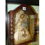 AN ANTIQUE CONTINENTAL CARVED AND GLAZED CASE CONTAINING A WAX HEAD FIGURAL GROUP OF A MOTHER AND