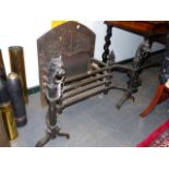 AN IMPRESSIVE LATE VICTORIAN GOTHIC REVIVAL WROUGHT AND CAST IRON FIREPLACE, GRATE AND BACK.