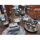 A COLLECTION OF SILVER PLATEDWARES, CUTLERY AND TWO CLOCKS.