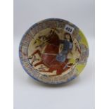 AN EARLY MIDDLE EASTERN POTTERY CONICAL FORM BOWL DECORATED WITH AN EQUESTRIAN FIGURE. D.20.5cms.