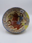 AN EARLY MIDDLE EASTERN POTTERY CONICAL FORM BOWL DECORATED WITH AN EQUESTRIAN FIGURE. D.20.5cms.