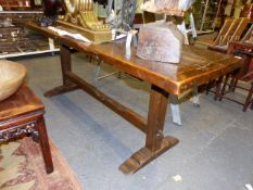 A 17th.C.AND LATER OAK REFECTORY TABLE WITH A SINGLE PLANK TOP, NOW WITH BREADBOARD ENDS ON SQUARE