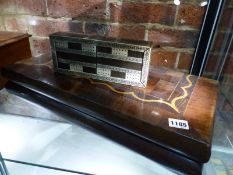 AN EARLY INLAID WALNUT LARGE FOLDING GAMES BOARD WITH BACKGAMMON INTERIOR TOGETHER WITH AN INLAID