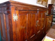 AN UNUSUAL 18th.C.AND LATER YEW WOOD TWO DOOR HALL CABINET WITH PANELLED DOORS AND SIDES. APPROX.W.