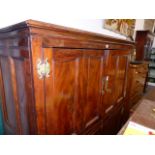 AN UNUSUAL 18th.C.AND LATER YEW WOOD TWO DOOR HALL CABINET WITH PANELLED DOORS AND SIDES. APPROX.W.