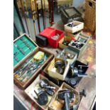 A LARGE COLLECTION OF VINTAGE FISHING RODS, SPINNING REELS AND FLOATS TOGETHER WITH AN EARLY 20th.