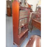 A MAHOGANY GEORGIAN STYLE BOOKCASE CABINET WITH THREE SHELVES ABOVE LOWER TWO DOOR CUPBOARD