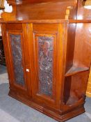A VICTORIAN MAHOGANY LARGE WALL HANGING CABINET WITH TWO CARVED PANEL DOORS.
