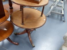 A 19th.C.MAHOGANY TWO TIER DUMB WAITER ON TRIPOD SUPPORT WITH BRASS CASTORS.