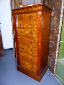 A VICTORIAN BURR WALNUT SIDE LOCKING WELLINGTON CHEST OF SEVEN GRADUATED DRAWERS WITH MOULDED EDGE