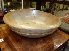 AN ANTIQUE TREEN SYCAMORE LARGE TURNED BOWL. D.49cms.