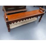 A 19th.C.CARVED OAK WINDOW SEAT WITH BOBBIN TURNED ENDS. W.132cms.