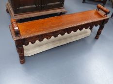 A 19th.C.CARVED OAK WINDOW SEAT WITH BOBBIN TURNED ENDS. W.132cms.