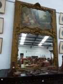 A LARGE FRENCH GILT FRAMED TRUMEAU MIRROR WITH OIL PAINTED PASTORAL SCENE WITHIN SCROLL BORDER. W.