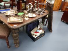 A VICTORIAN CARVED OAK WIND OUT EXTENDING DINING TABLE WITH TWO LEAVES. 106 x 203cms. EXTENDED.