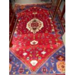 A PERSIAN SHIRAZ CARPET. 276 x 185cms.