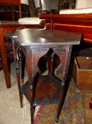 AN ARTS AND CRAFTS OAK LIBERTY STYLE OCTAGONAL OCCASIONAL TABLE. W.46x H.69cms.
