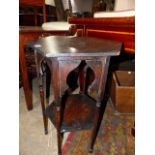 AN ARTS AND CRAFTS OAK LIBERTY STYLE OCTAGONAL OCCASIONAL TABLE. W.46x H.69cms.