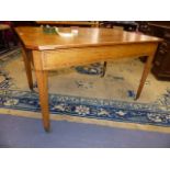 A 19th.C.OAK AND LATER PINE CENTRE TABLE ON SQUARE TAPERED LEGS WITH BRASS CASTORS. 81x122cms.