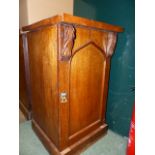 A PAIR OF VICTORIAN OAK BEDSIDE CABINETS WITH GOTHIC PANEL DOORS. W.45 x H.80cms.