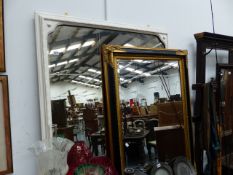 A VICTORIAN OVERMANTLE MIRROR WITH PAINTED FRAMED AND A LATER VICTORIAN STYLE WALL MIRROR.