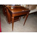 AN EDWARDIAN INLAID MAHOGANY FOLD OVER PATIENCE TABLE.