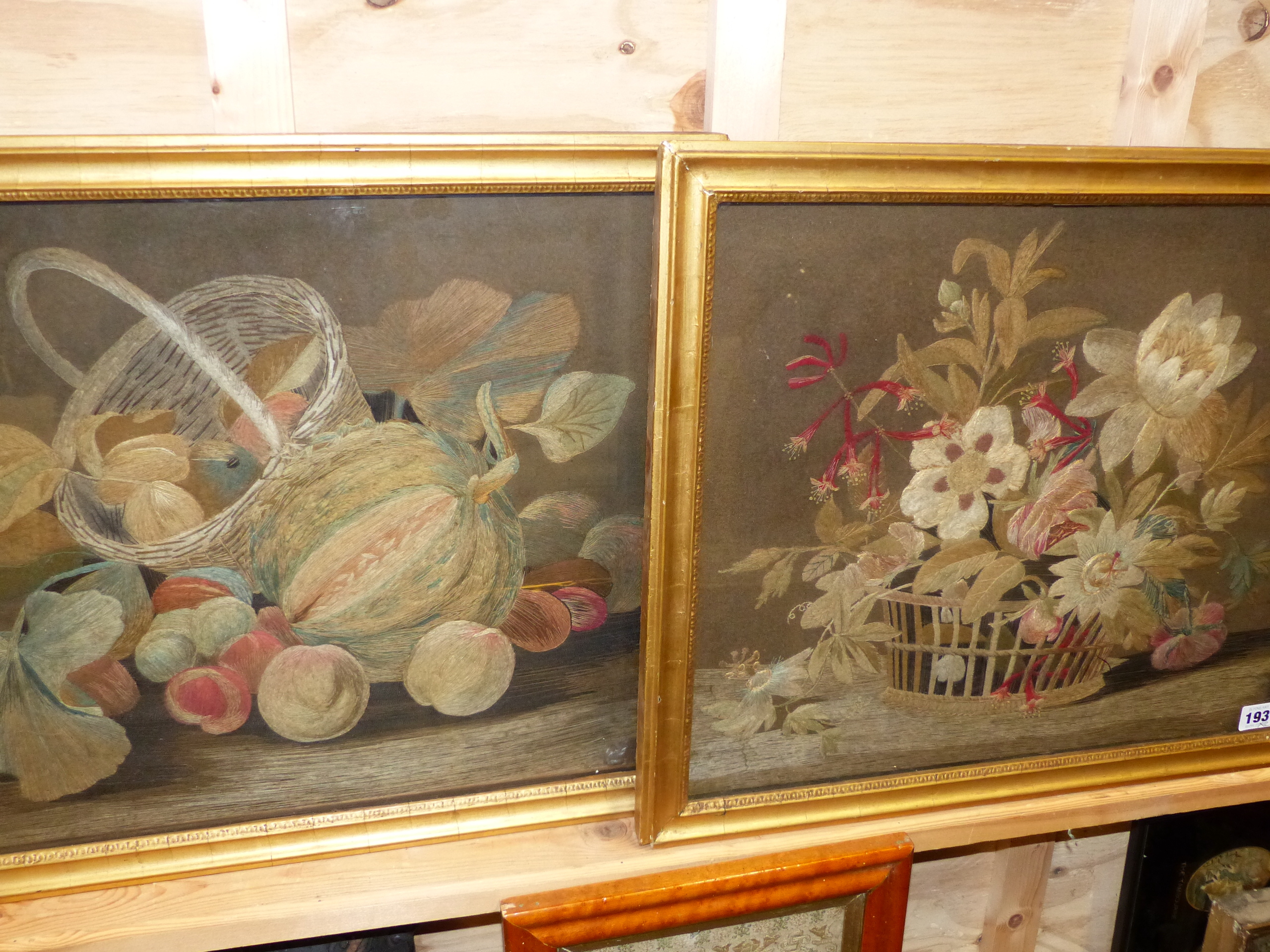 A PAIR OF ANTIQUE FELT AND SILWORK PICTURES OF STILL LIFE SUBJECTS, ONE OF FLOWERS IN A BASKET,