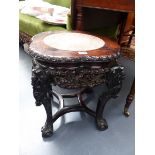 A CHINESE MARBLE TOP CARVED HARDWOOD STAND WITH SHAPED TOP AND PIERCED APRON. H.48 W.50cms.