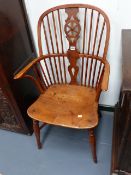 A PAIR OF 19th.C.YEW WOOD AND ELM WINDSOR WHEELBACK ARMCHAIRS WITH CRINOLINE STRETCHERS.