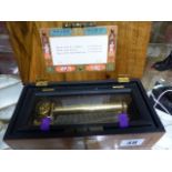 A SMALL SWISS MUSIC BOX PLAYING 3 AIRS BY TCHAIKOVSKY, LABELLED REUGE MUSIC, SAINT CROIX,