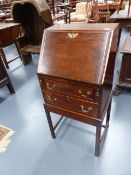 A SMALL EARLY 20th.C.MAHOGANY WRITING BUREAU. W.46cms.