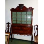 AN ANTIQUE DUTCH MARQUETRY INLAID CABINET IN THE 18th.C.STYLE. SHAPED PEDIMENT WITH CARVED