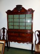 AN ANTIQUE DUTCH MARQUETRY INLAID CABINET IN THE 18th.C.STYLE. SHAPED PEDIMENT WITH CARVED