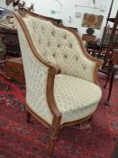 TWO FRENCH STYLE CARVED FRAME TUB FORM ARMCHAIRS, ONE IN THE LOUIS XV STYLE, THE OTHER LOUIS XVI