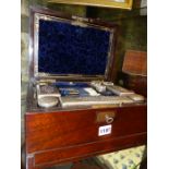 A VICTORIAN ROSEWOOD DRESSING CASE WITH SILVER PLATE FITTINGS, GLASS BOTTLES,ETC.
