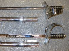 A PAIR OF ERII DRESS SWORDS WITH PLATED ENGRAVED AND PLATED SCABBARDS. (2)