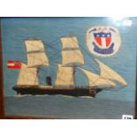 A VINTAGE WOOLWORK PICTURE OF A SAIL/STEAMSHIP, INSET CREST. 32 x 42cms.