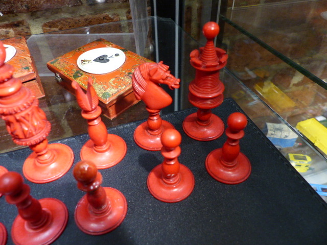 THREE ANTIQUE CARVED AND STAINED IVORY AND BONE BOARD GAME PIECES, TWO CHESS SETS AND A SET OF - Image 21 of 86