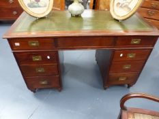 A 19th.C.MAHOGANY PEDESTAL WRITING TABLE OF CAMPAIGN TYPE WITH BRASS RECESSED HANDLES. W.127cms.