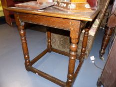 AN 18th.C.OAK SIDE TABLE ON TURNED LEGS WITH STRETCHER BASE. 67 x 52cms.