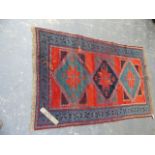 AN ANTIQUE CAUCASIAN TRIBAL RUG. 188x118cms.